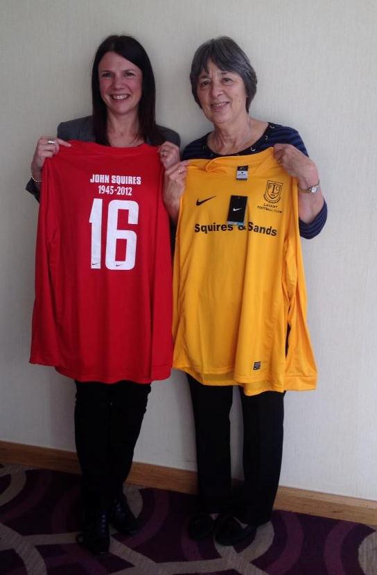 Kay and Jan Squires proudly show off the new home Reserve shirt (Jan) and also the away kit (Kay) for both teams which the club has added above each shirt number John Squires name in honour of John who was a player and a keen supporter of the club. 