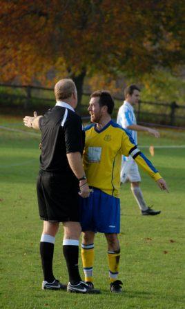Mike Neville having a chat with the ref LFC vs Hunston 311009